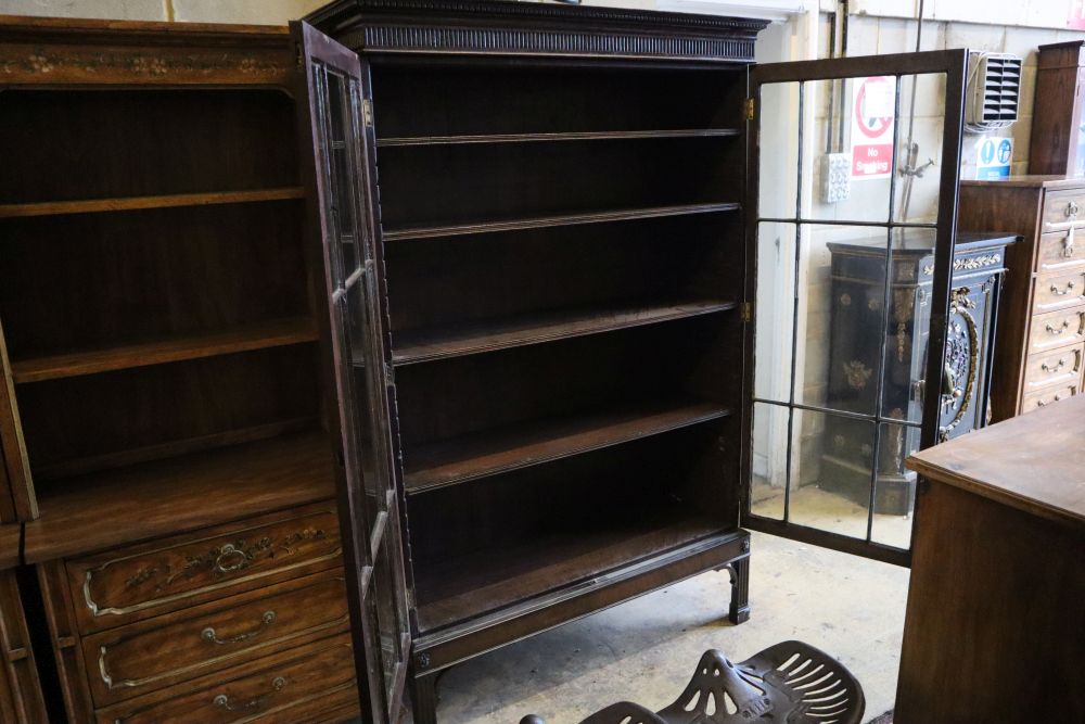 A George III style mahogany bookcase, width 118cm, depth 39cm, height 185cm